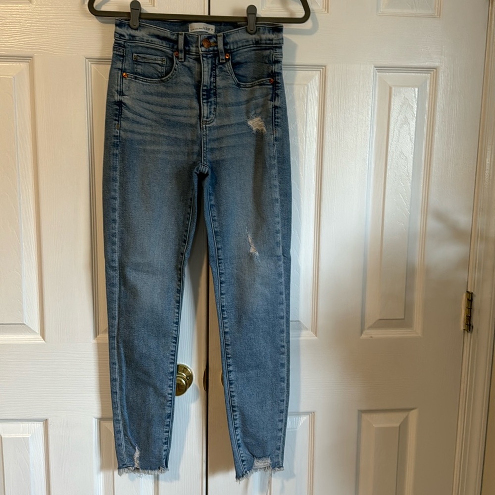Loft size 0 high waist skinny ankle jean with frayed ankles